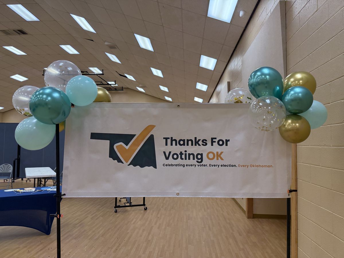 ThanksForVotingOK banner with teal and gold balloons at Vote Ready Oklahoma